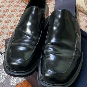Prada men’s slip-on black shoes.